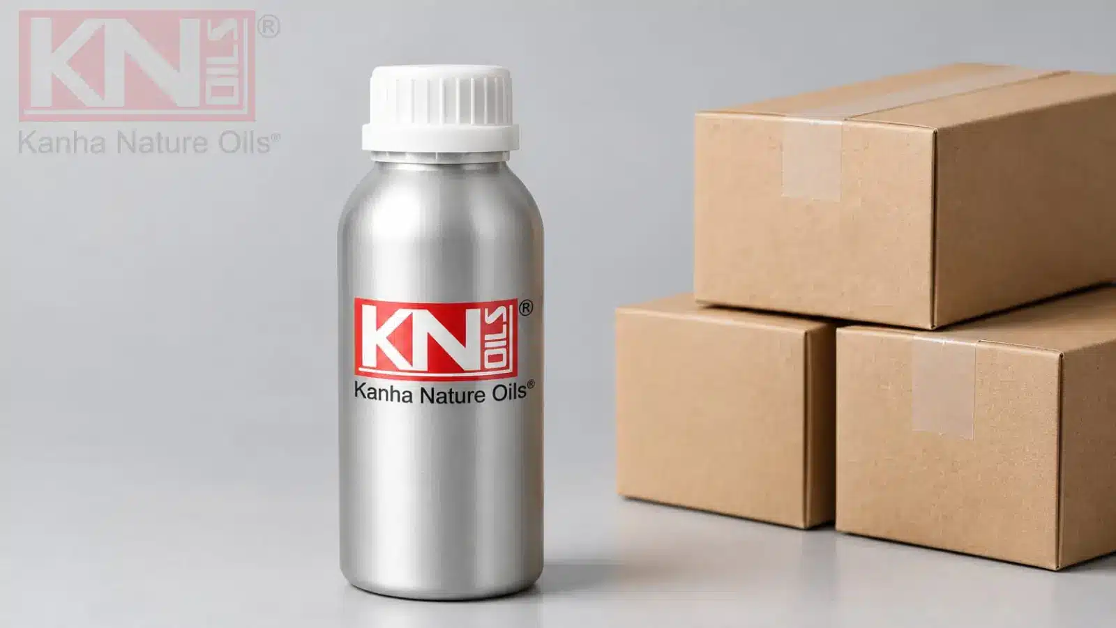 Amber glass 100 ml essential oil trial pack bottle beside shipping boxes